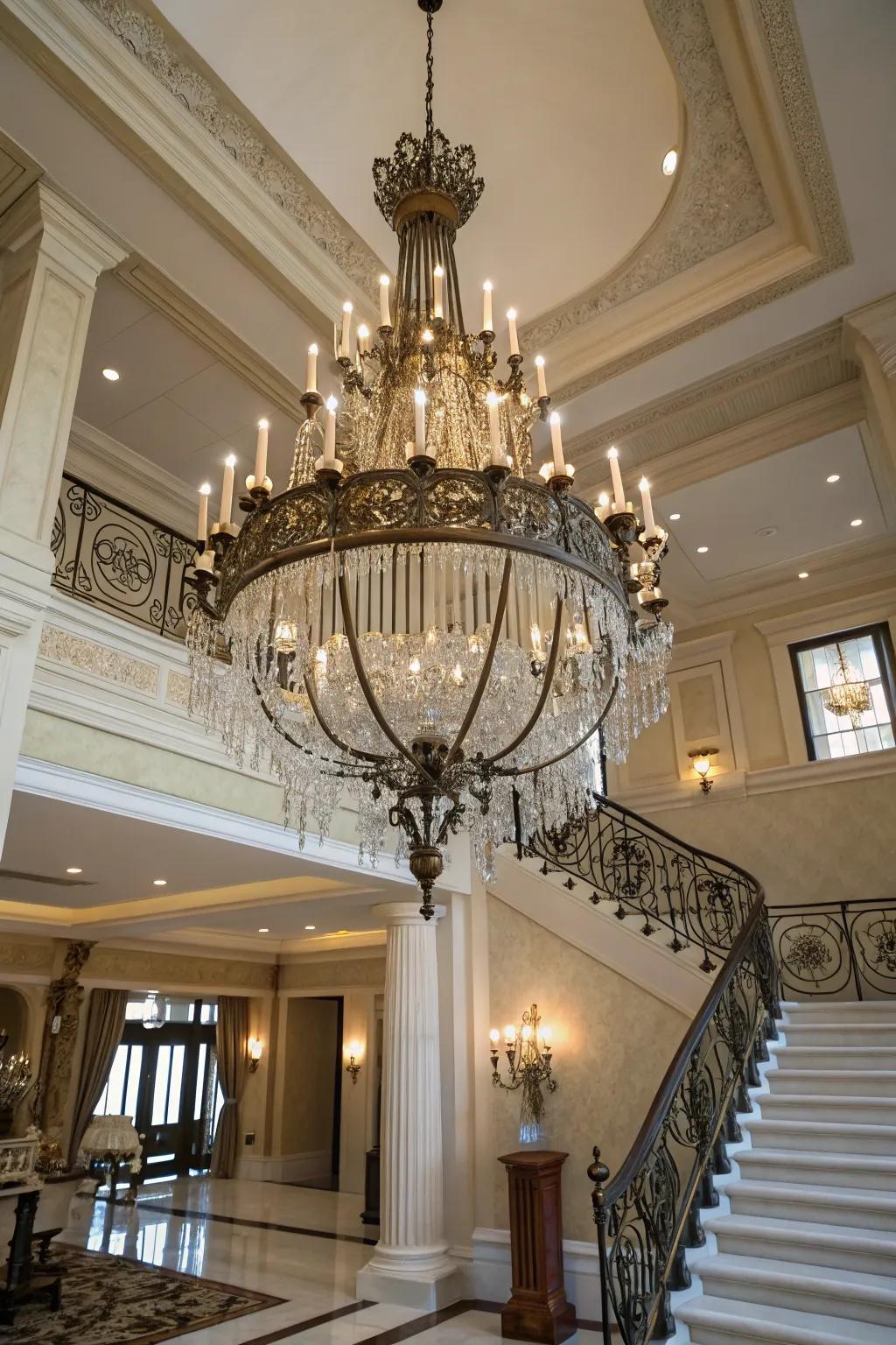 A dramatic chandelier adds elegance to a two-story foyer.