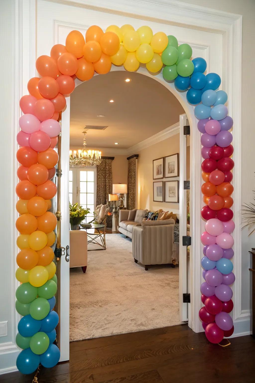 A bright balloon arch adds a festive feel to a birthday entrance.