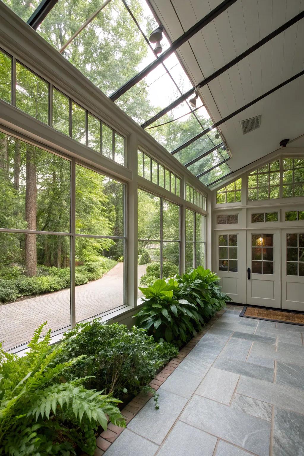 A glass-enclosed breezeway that welcomes the outdoors in, offering a bright transition from garage to house.