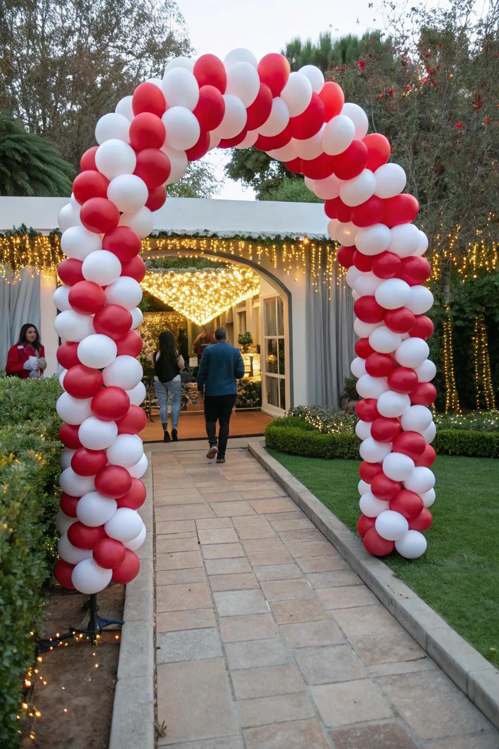 Extend a warm welcome with a charming candy cane balloon arch.