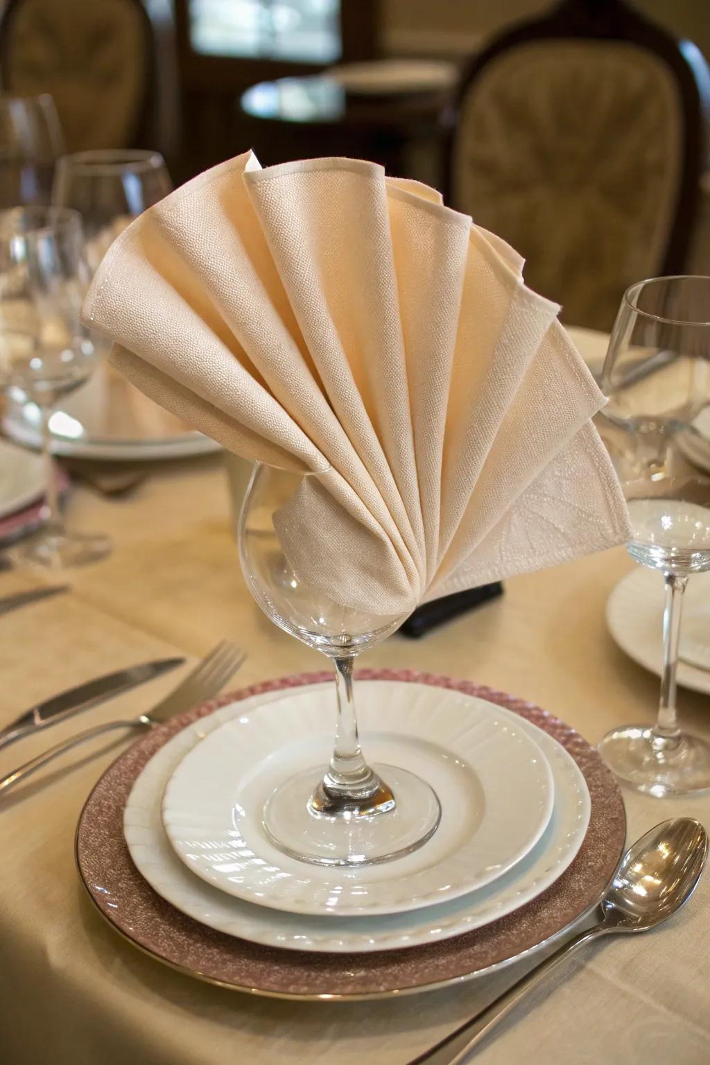 The classic fan napkin fold, ideal for any elegant event.