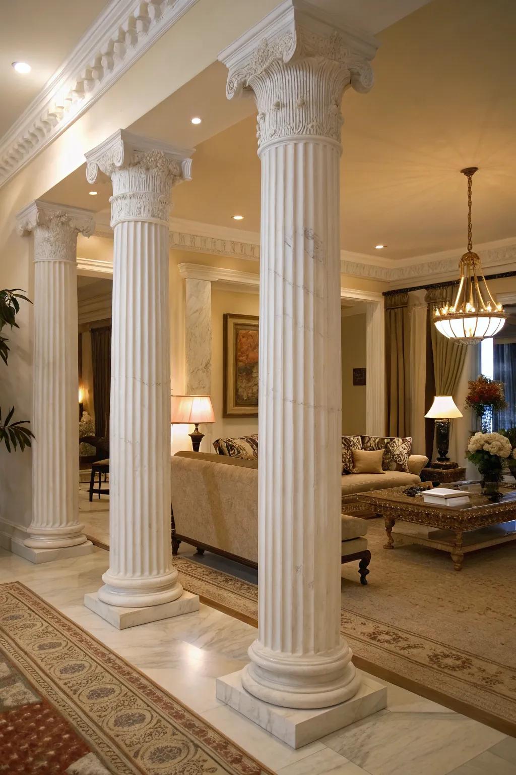 White marble grooved columns enhancing a modern living space with classic elegance.