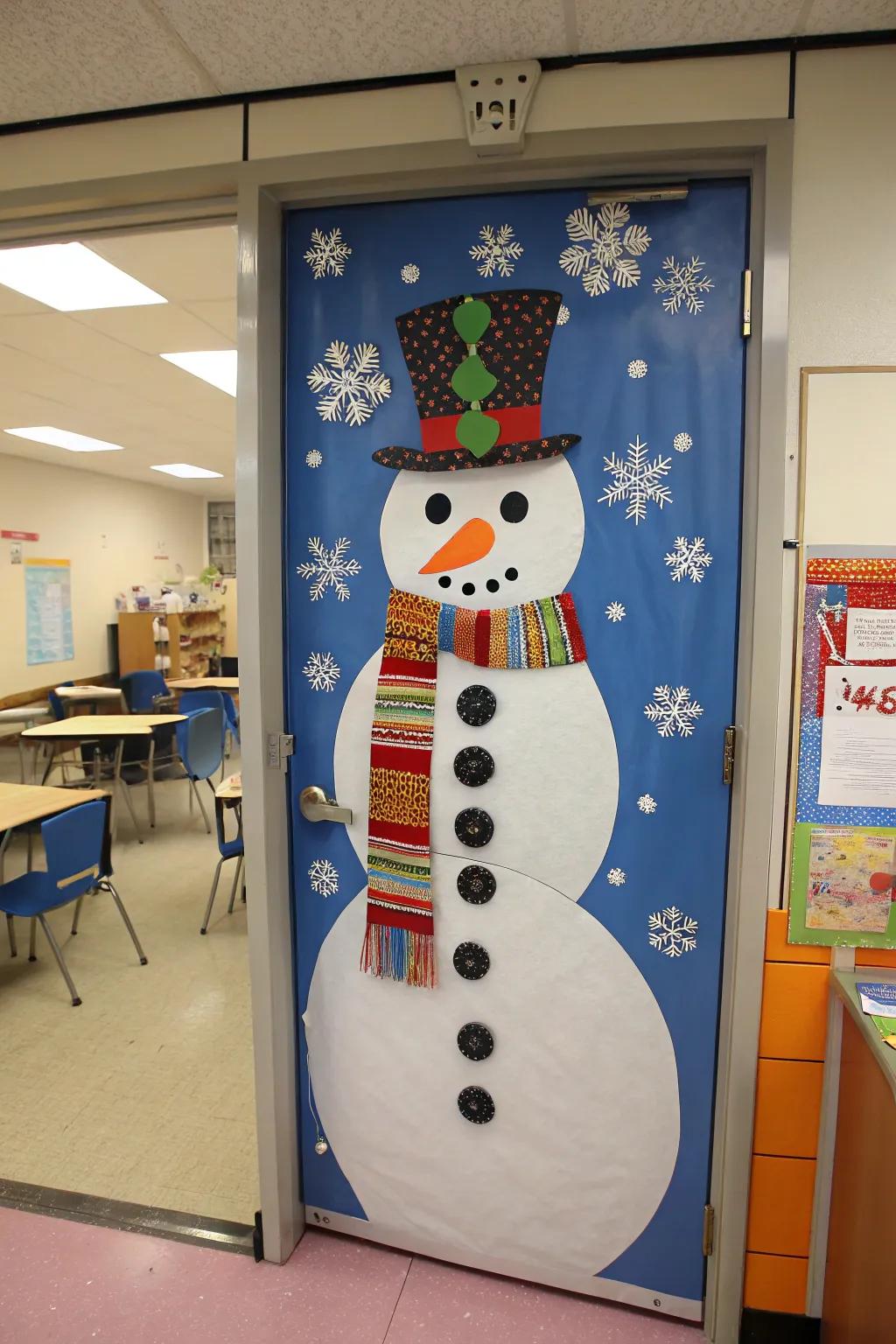 A classroom door decorated as a happy snowman, complete with a colorful scarf.