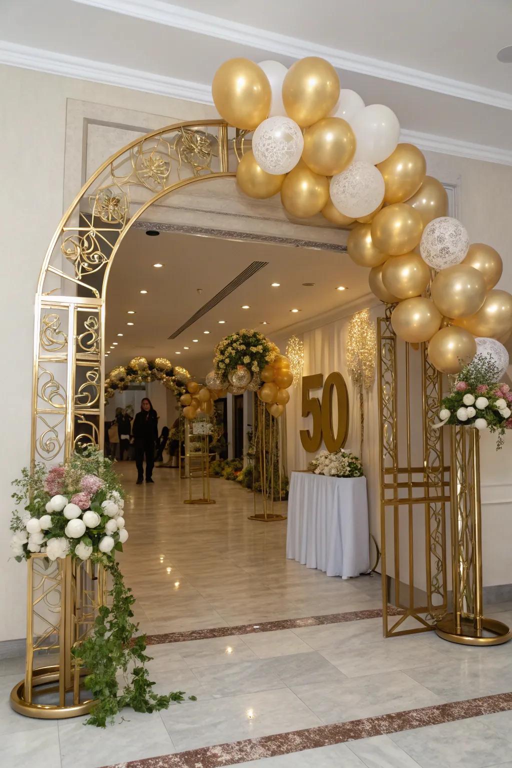 A stunning golden balloon arch welcomes attendees to the event.