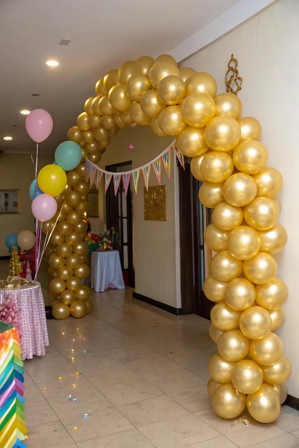 A stunning gold balloon arch for a grand entrance.