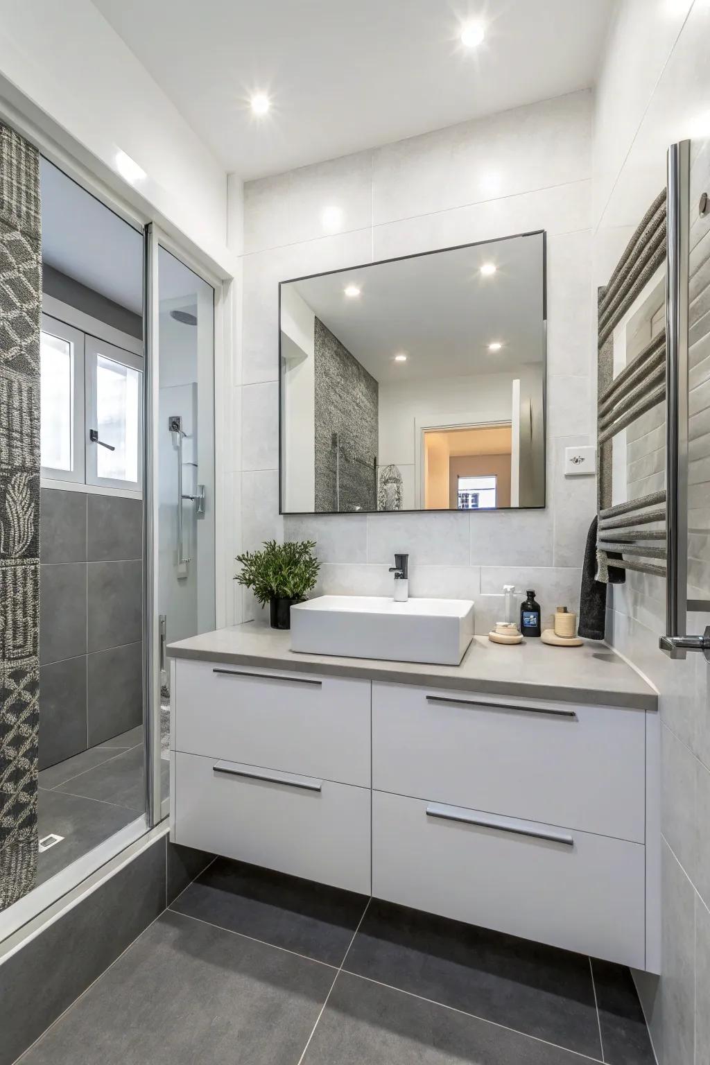 A timeless white bathroom is enhanced by subtle grey details for a sophisticated feel.