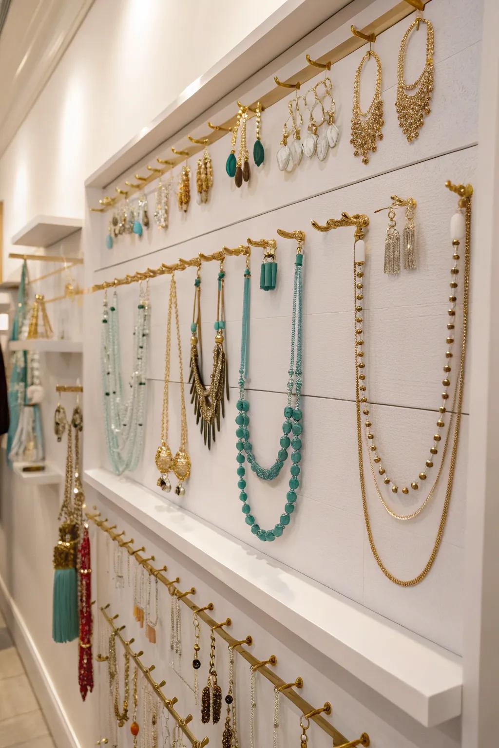 Using wall space efficiently with stylish hooks for jewelry.