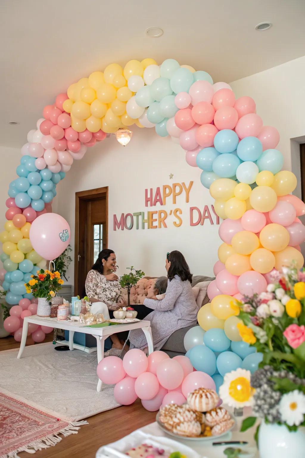 A beautiful pastel balloon arch perfect for celebrating Mother's Day.