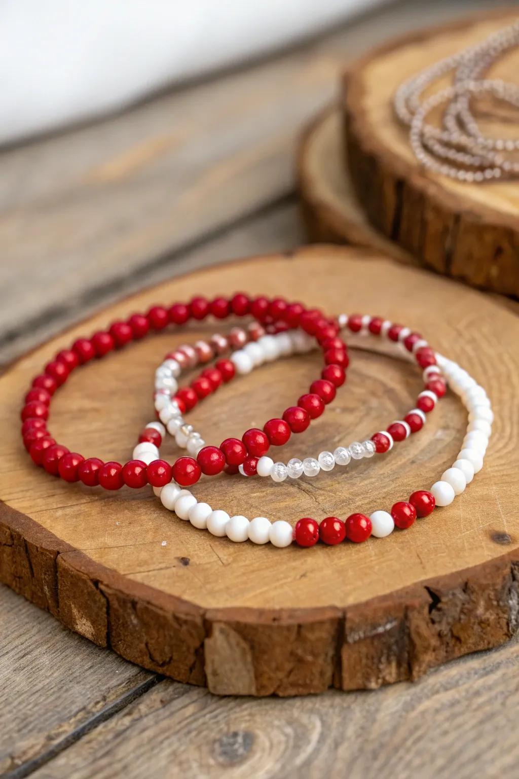 Elegant scarlet and ivory beaded wristbands enhance any ensemble.