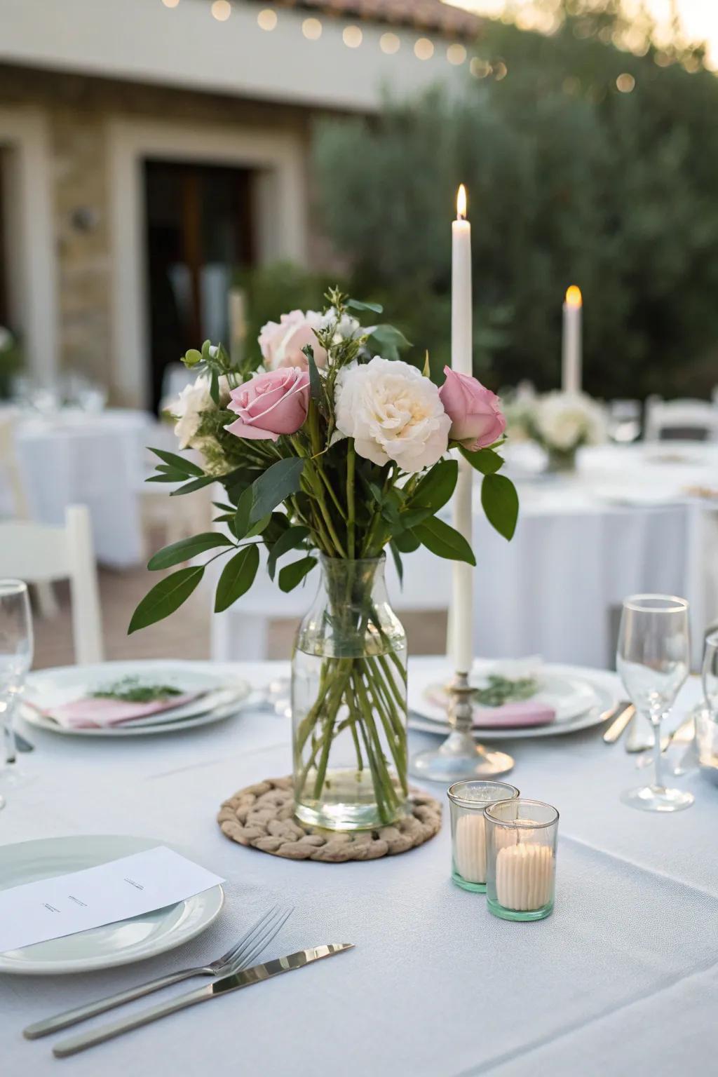 A basic peony vase enhances the elegance of the table arrangement.