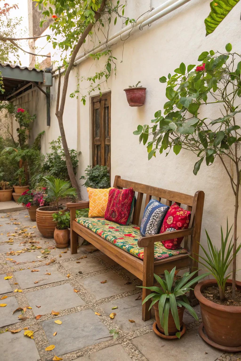A refreshed bench with vibrant cushions forms an inviting place to sit.