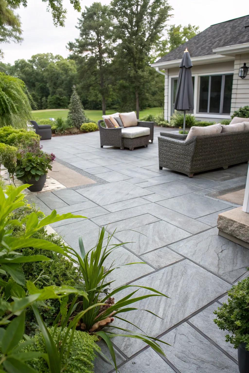 A sleek gray concrete patio that gives off modern sophistication.