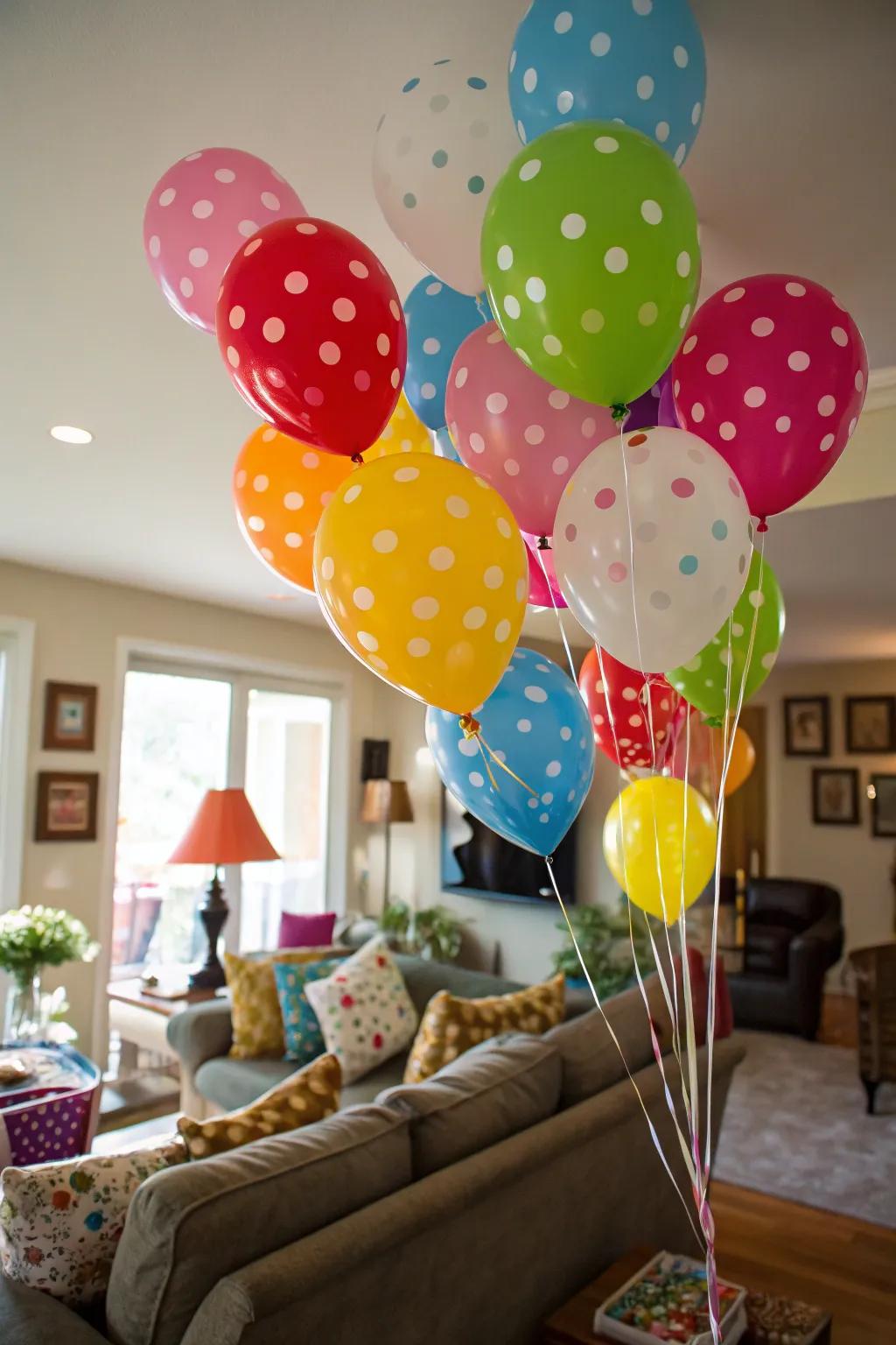 A family room transformed into a bright balloon wonderland for a toddler's special day.