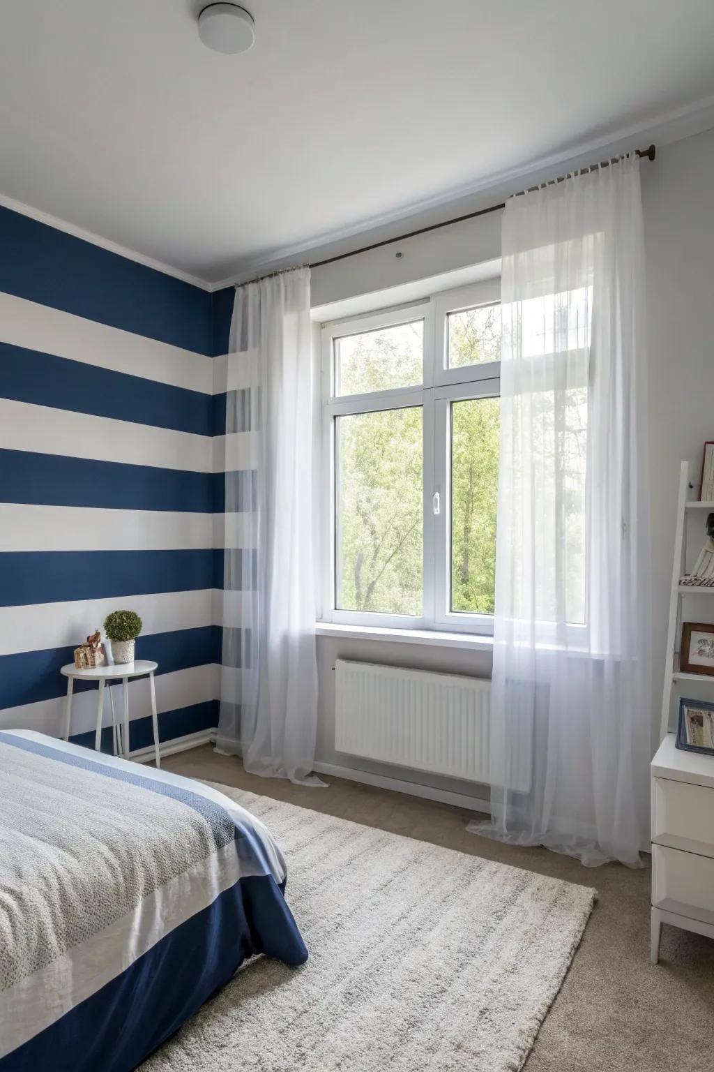 A bedroom featuring navy blue and white walls, creating a timeless and refreshing ambiance.