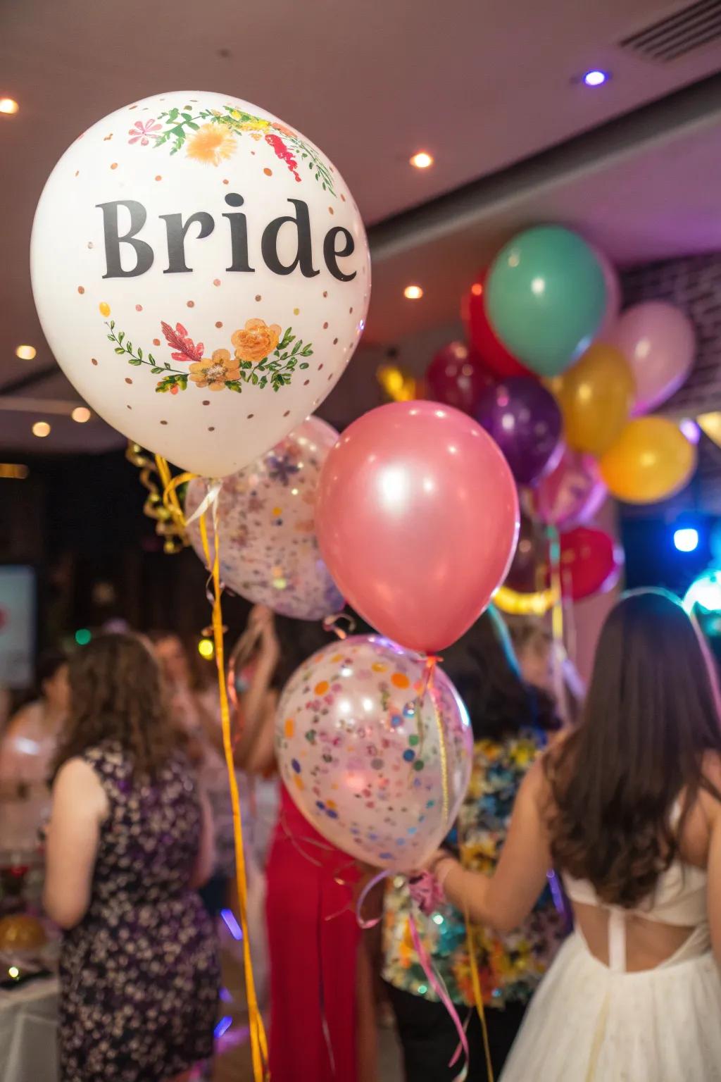 Personalized balloons bearing the bride's name.