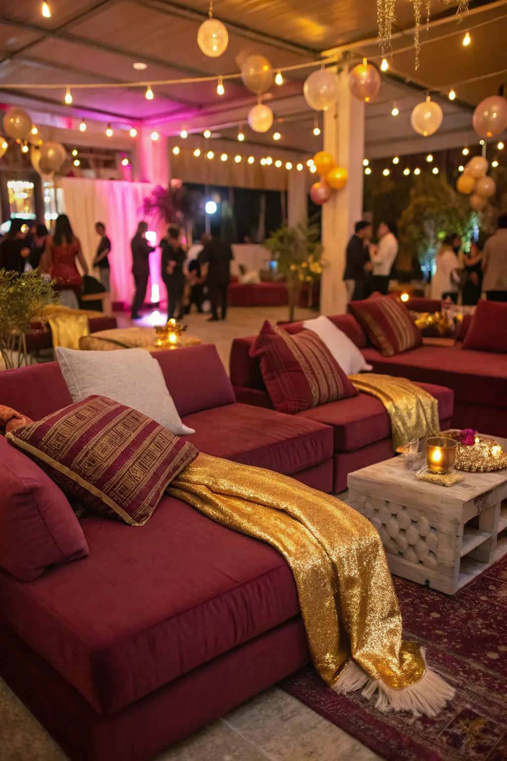 Cozy lounge areas with red and gold accents invite guests to relax.
