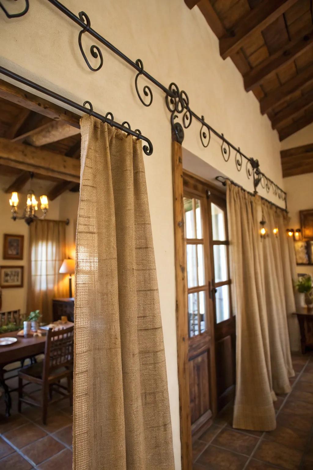 Country elegance with material drapes and wrought iron rods.