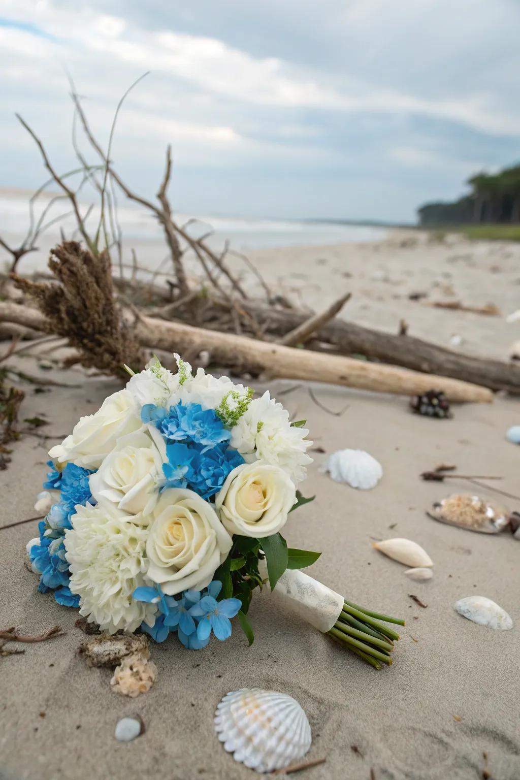 A beach-themed flower arrangement with blue and white blooms.