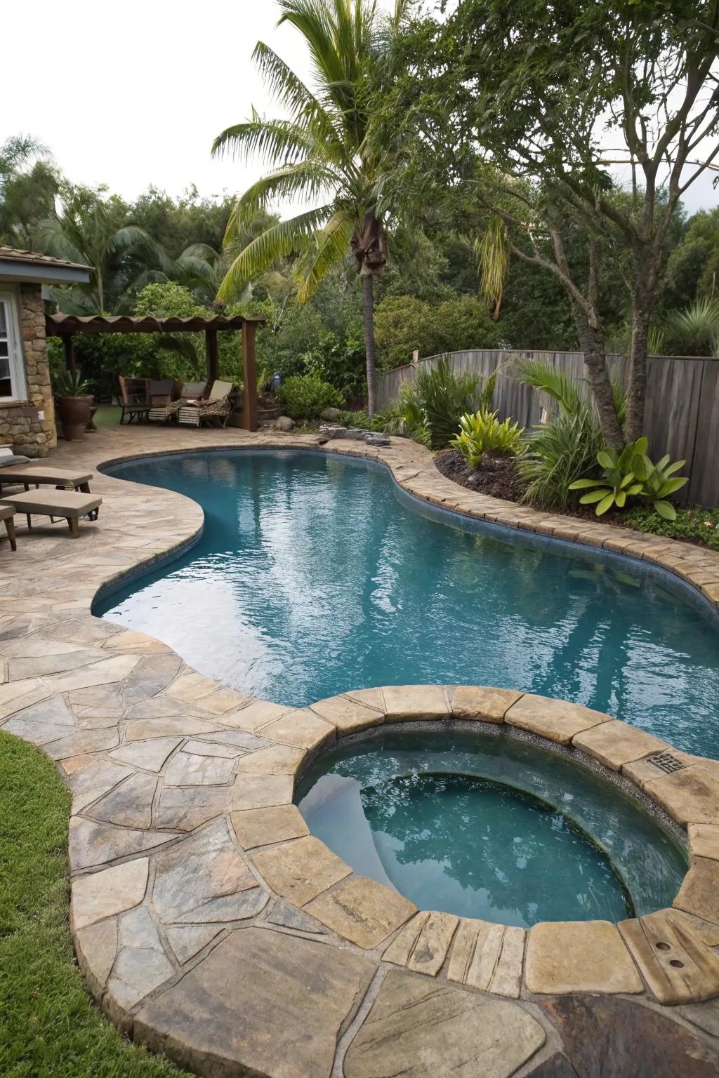 A uniquely shaped pool enhances the character of its backyard setting.