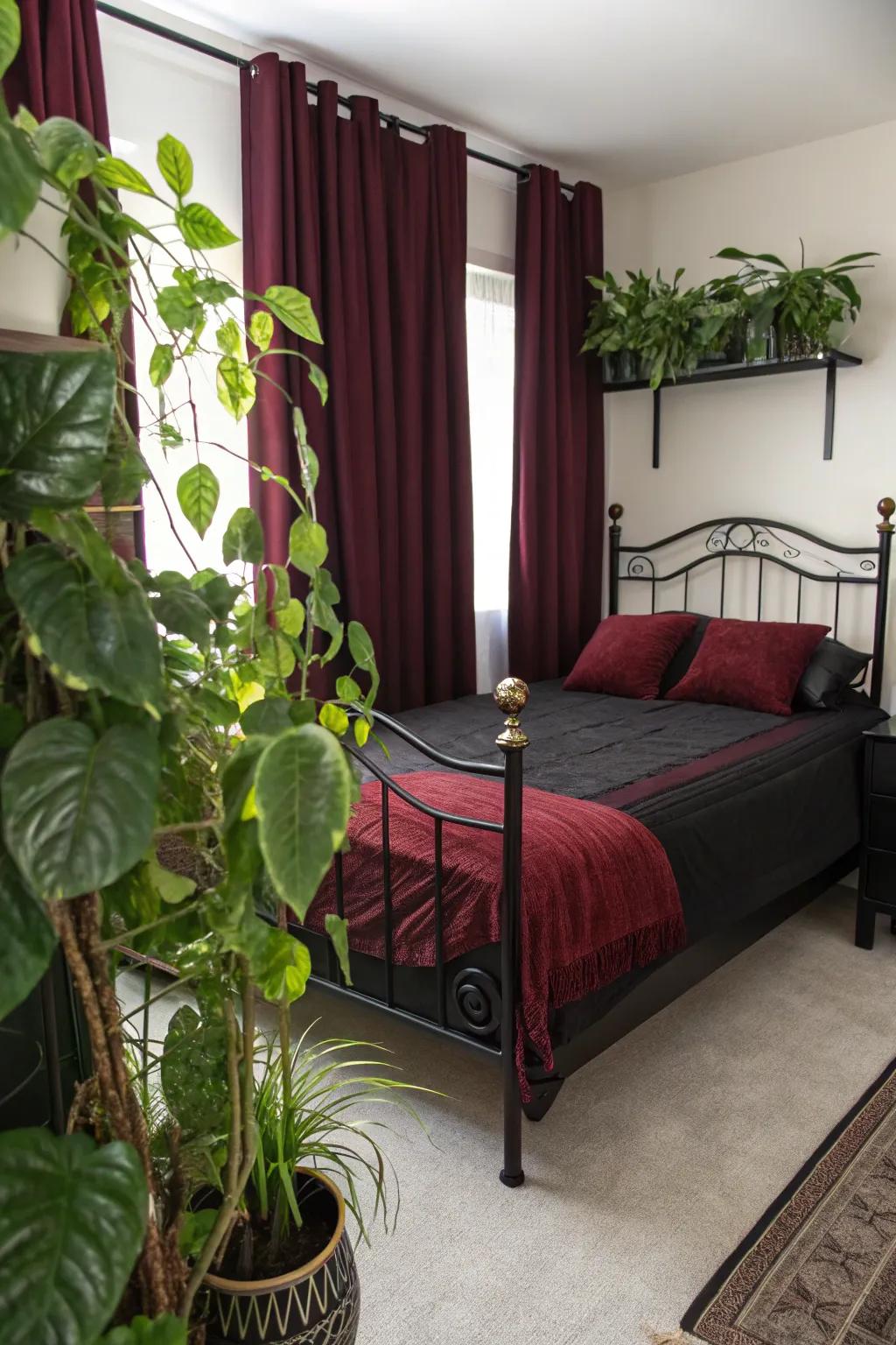 Greenery adds a refreshing, lively touch to your black and burgundy bedroom.