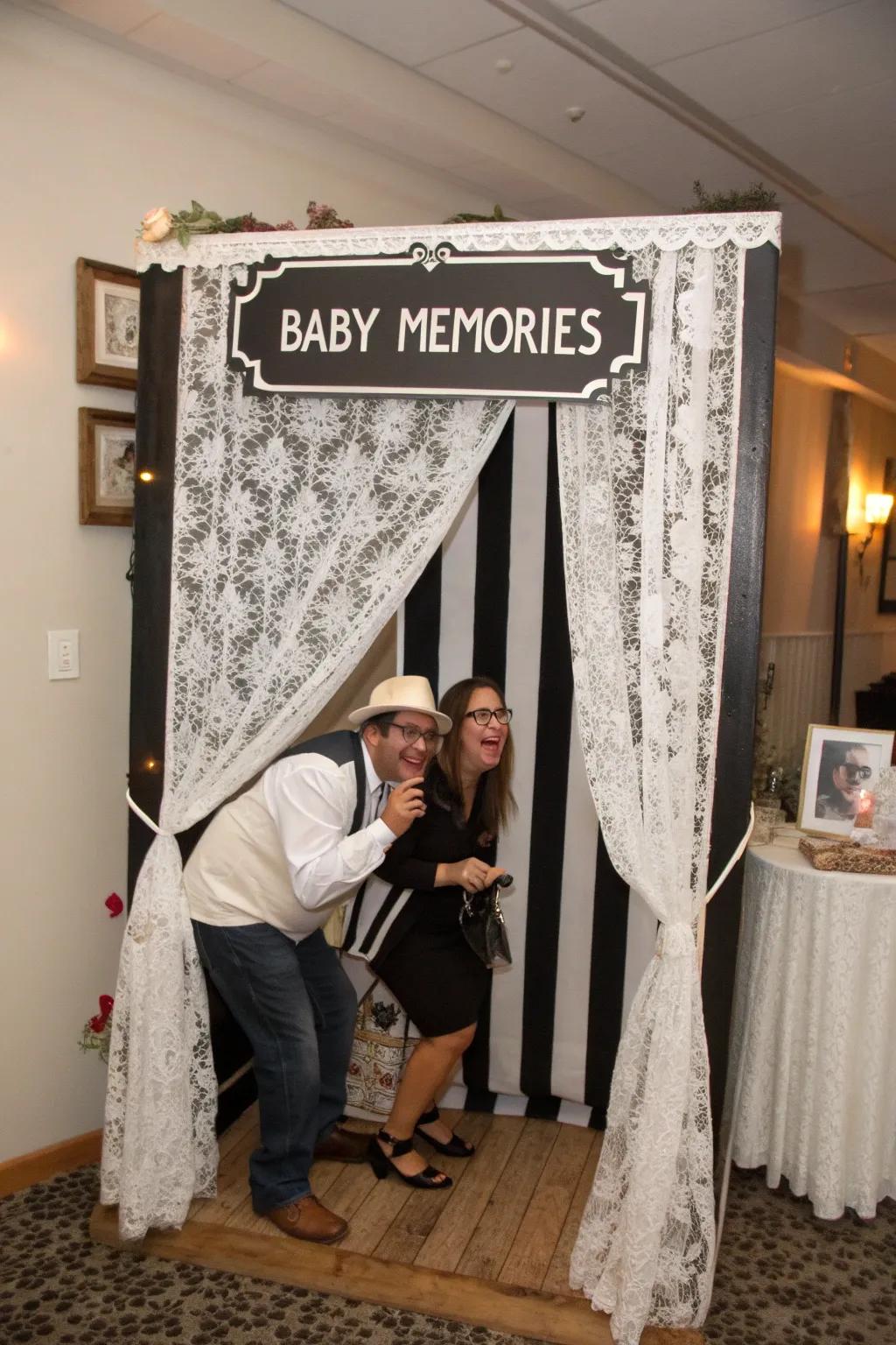 A fun photo booth with charcoal and white props.