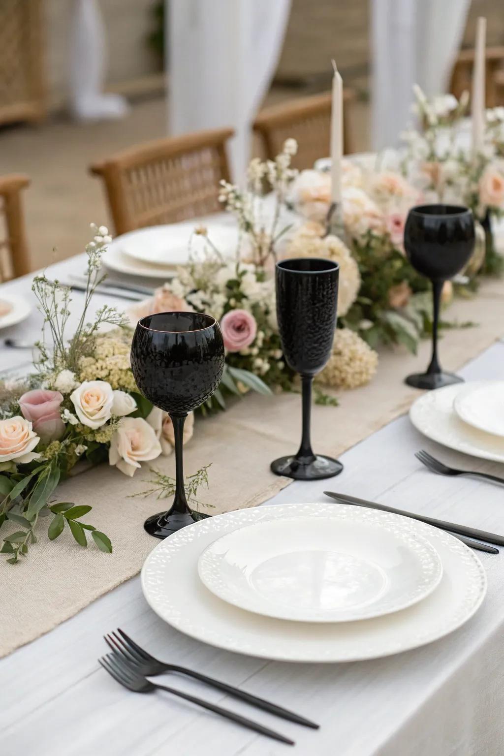 Dark glassware adds a sophisticated touch to the wedding tablescape.