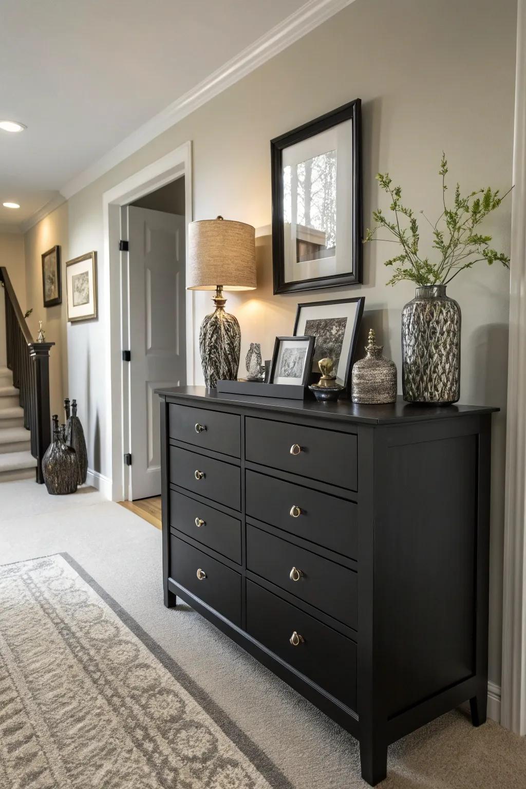A dark stained dresser providing chic storage in an elegant hallway.