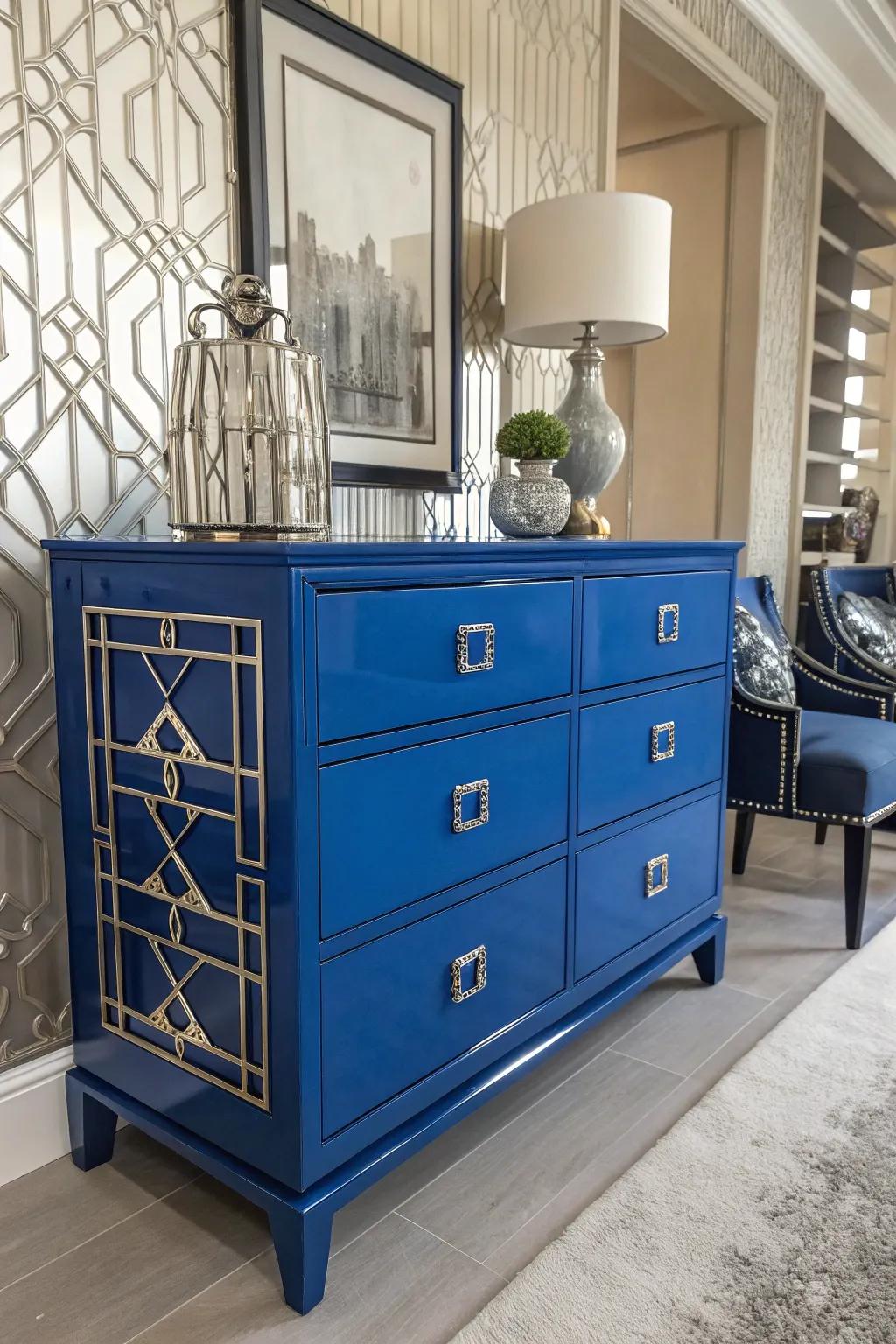 A shiny cobalt blue dresser with Art Deco influences.