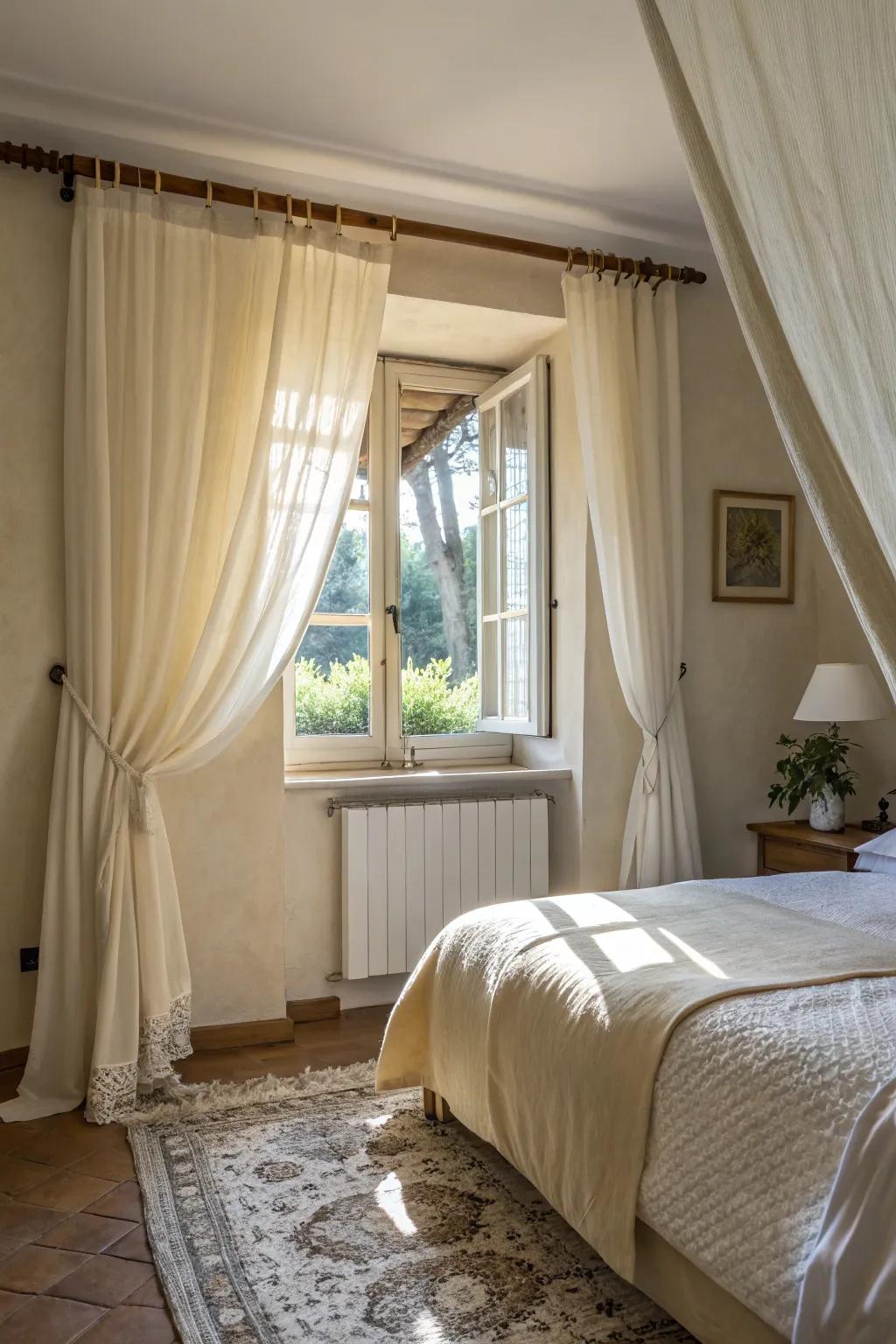 Light window fabrics enhance natural light penetration in a compact bedroom.