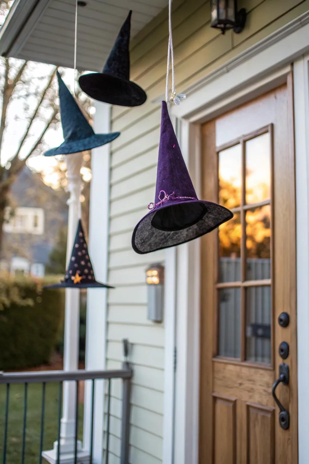 Drifting conical headpieces craft a magical Halloween display.