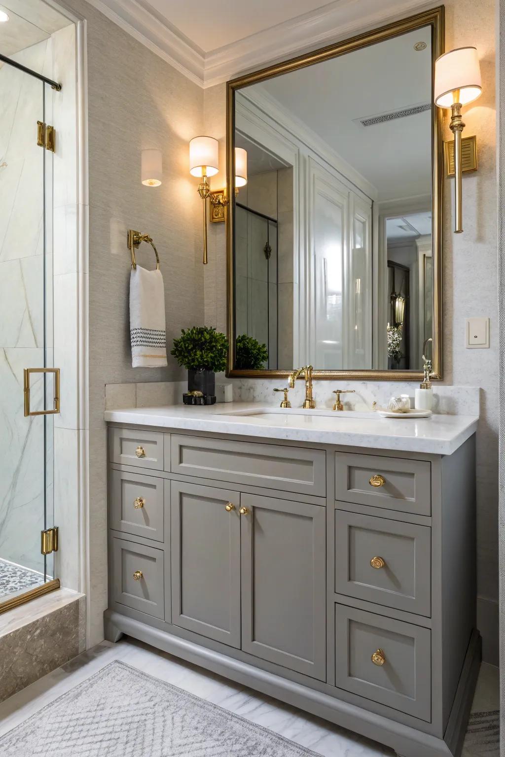 Brass components inject a warm, elegant element to the grey vanity.