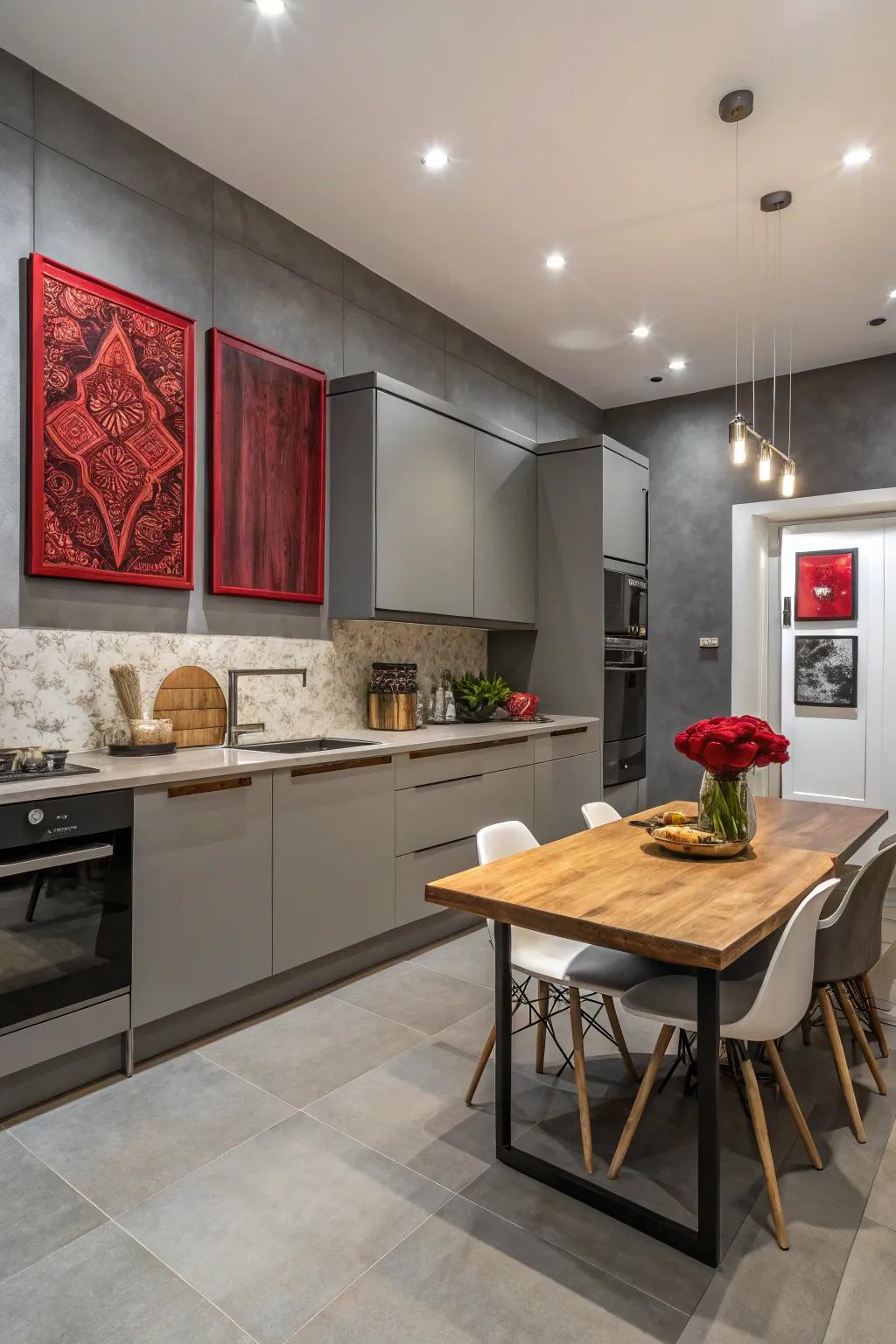 Scarlet canvases on gray walls crafting a sophisticated kitchen atmosphere.