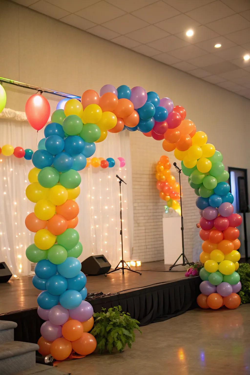 Festive balloon wreaths adding color and joy to the stage.