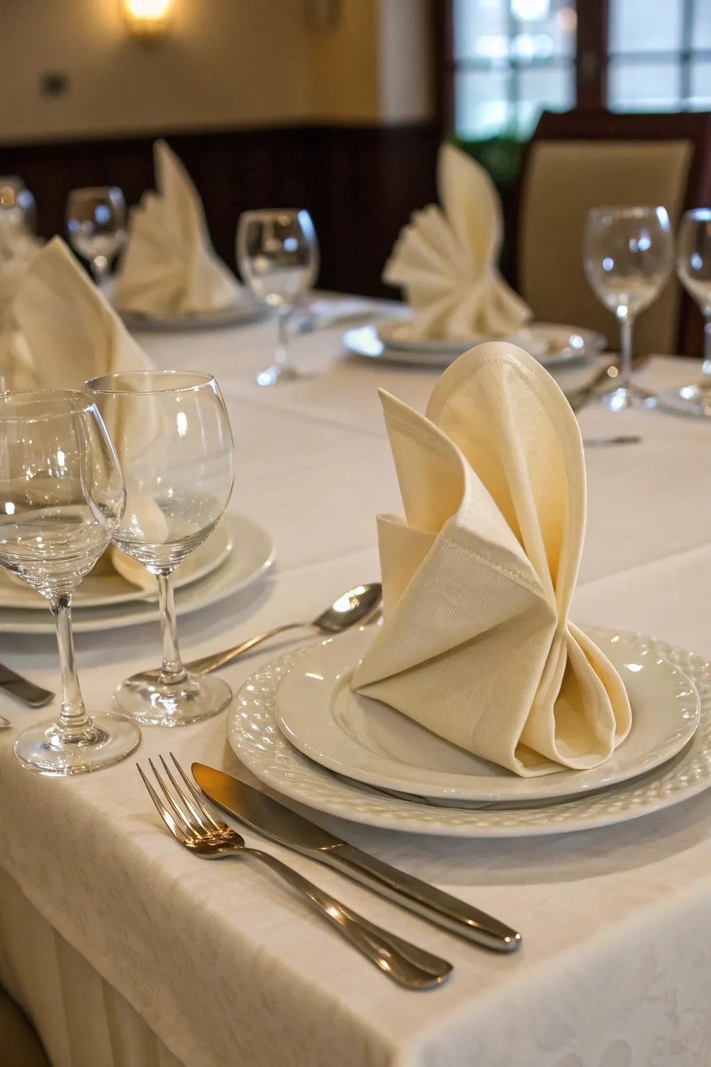 Each place setting is given a sense of flair with cutting-edge napkin folds.