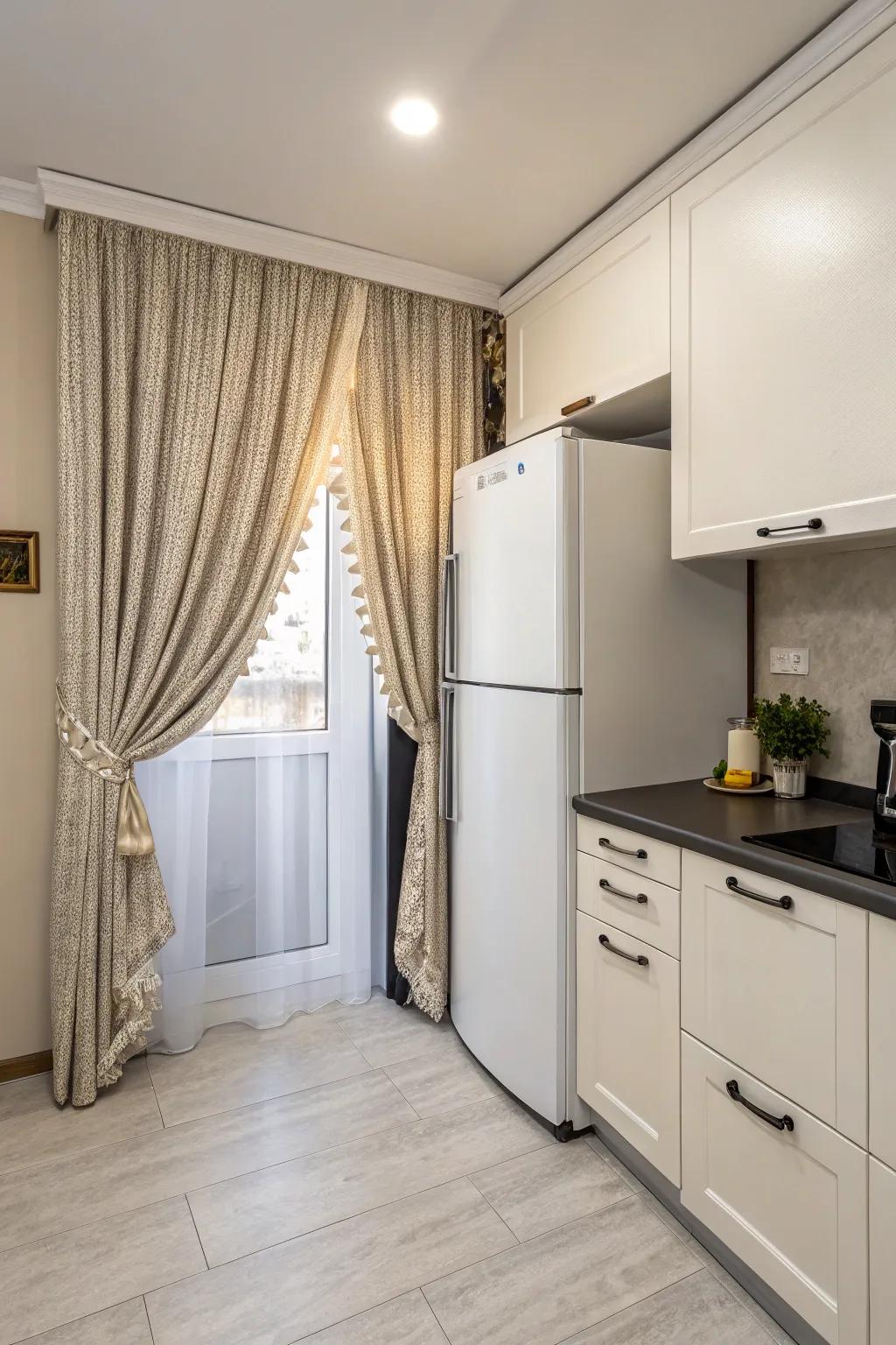 A curtain elegantly conceals the space above the fridge.