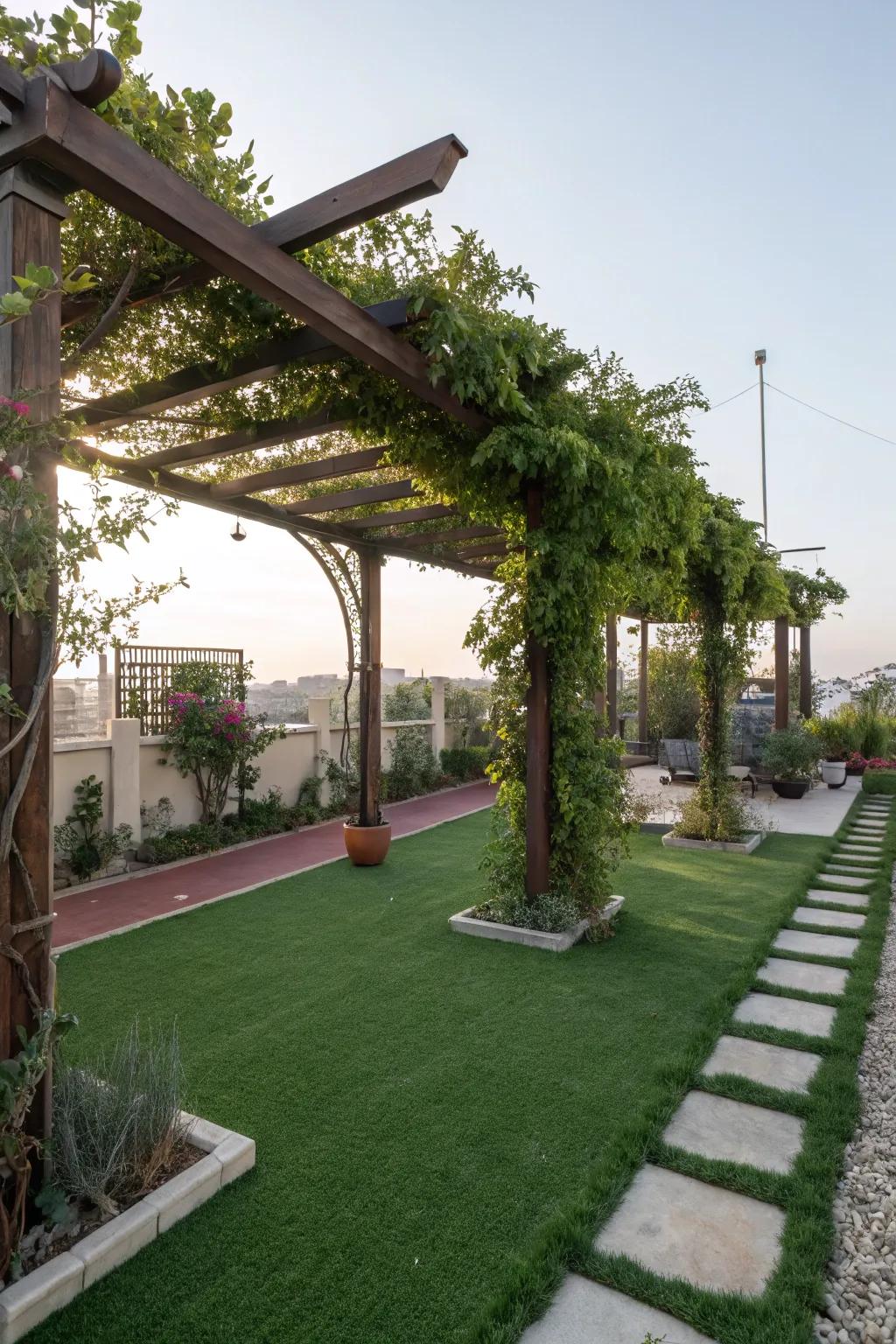 A shady pergola providing comfort over artificial lawn.