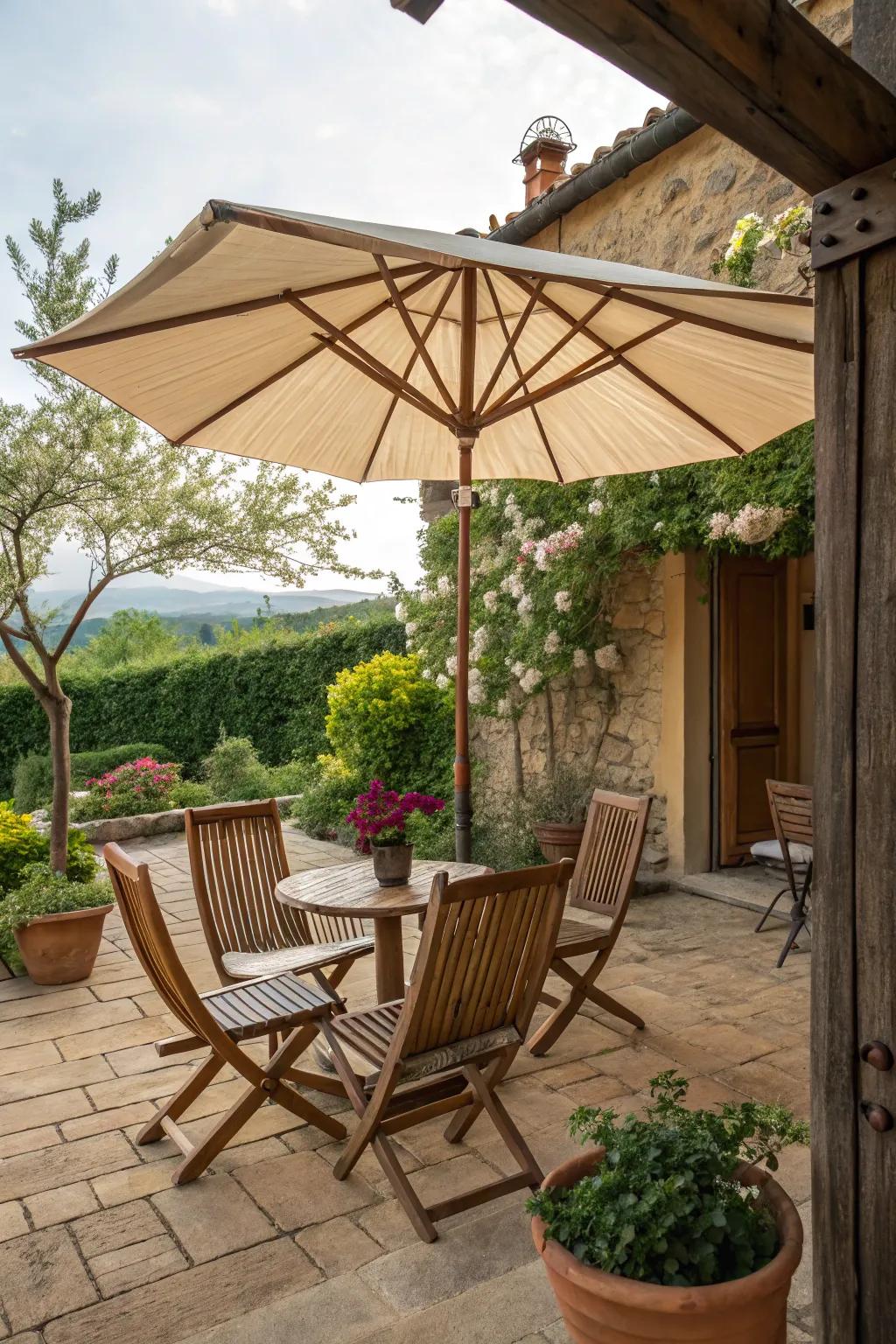 A rustic farmhouse patio featuring a wooden umbrella.