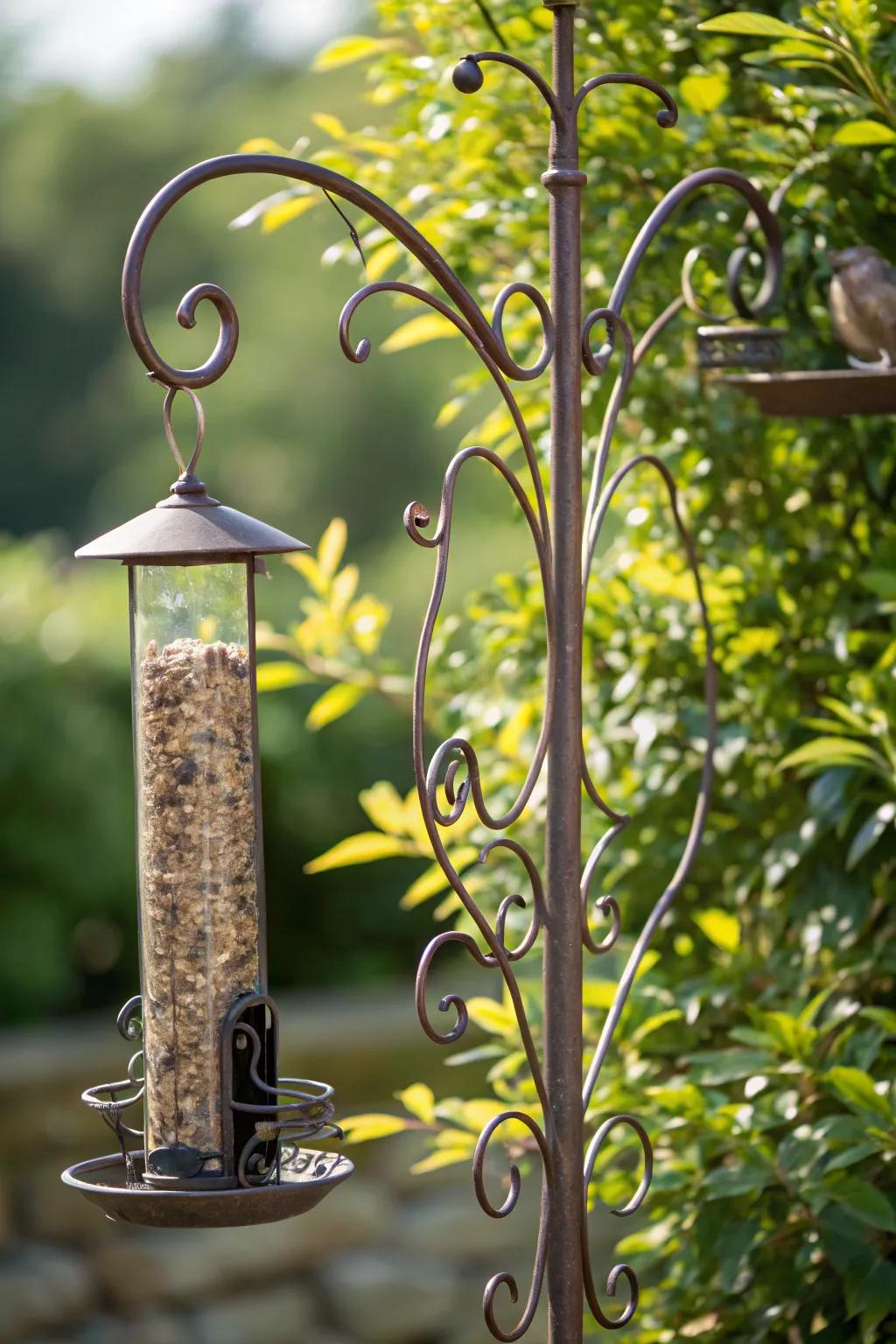 Timeless Elegance: A Forged Iron Bird Feeder Pole Exhibiting Unwavering Durability