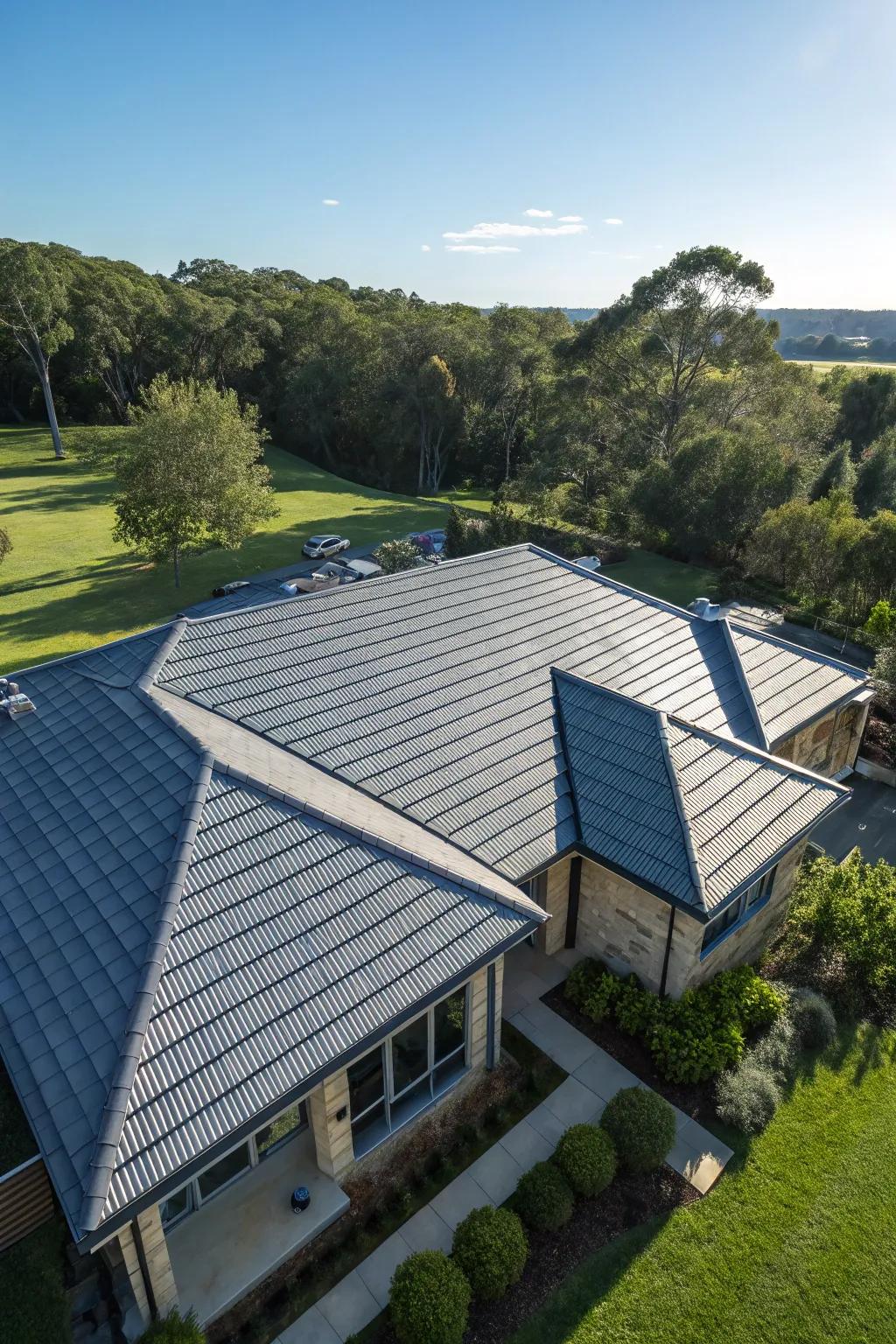 An aerial view of a house featuring energy-efficient chill roof tiles.