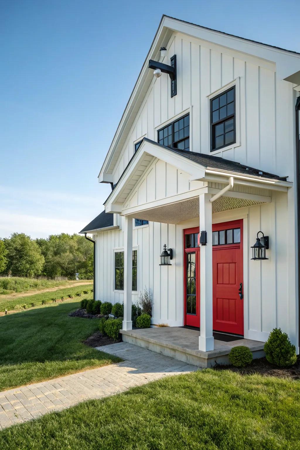 Modern farmhouse with a scarlet door, blending tradition with modernity.