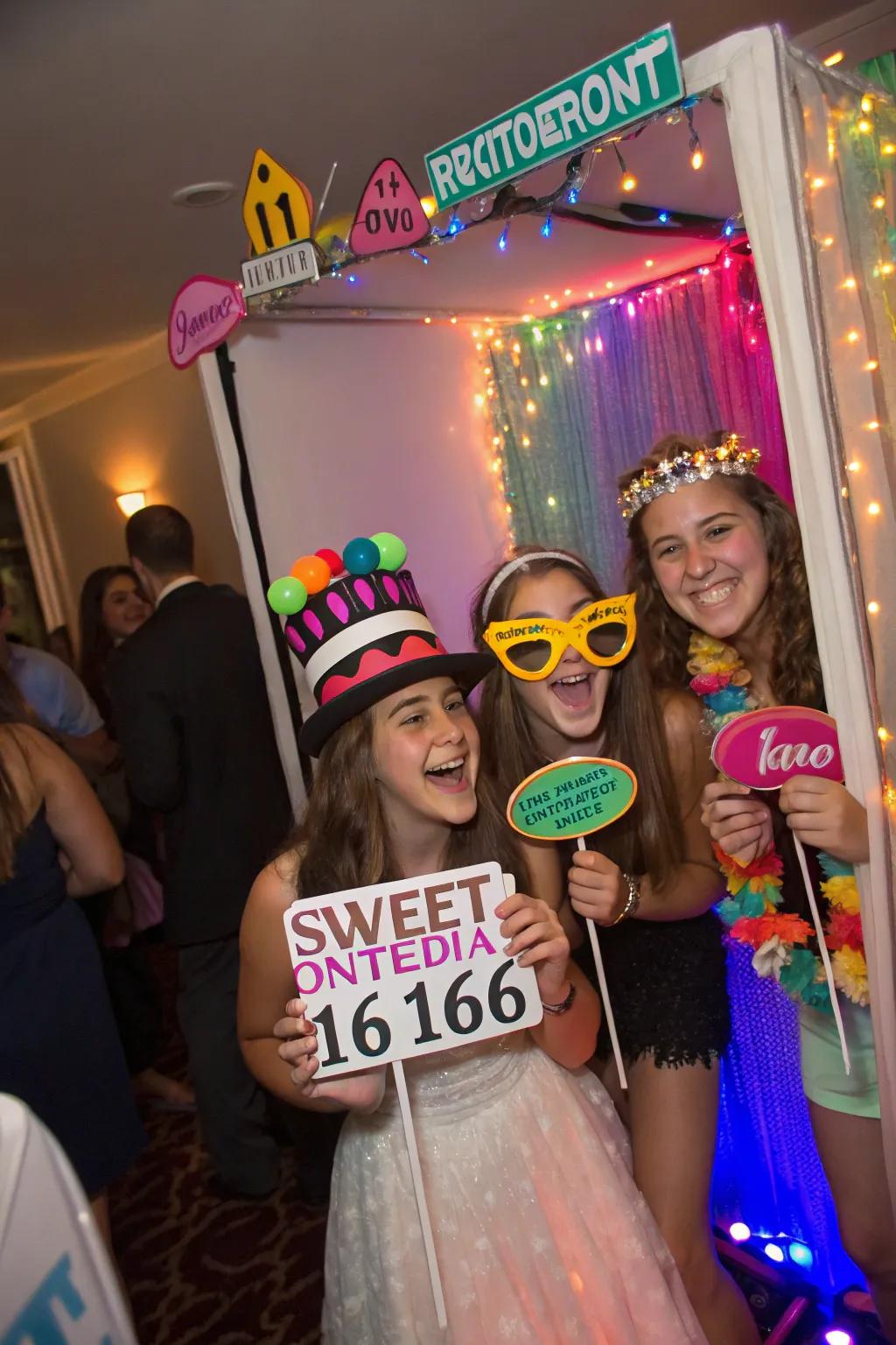 A personalized photobooth at a sweet sixteen fete.