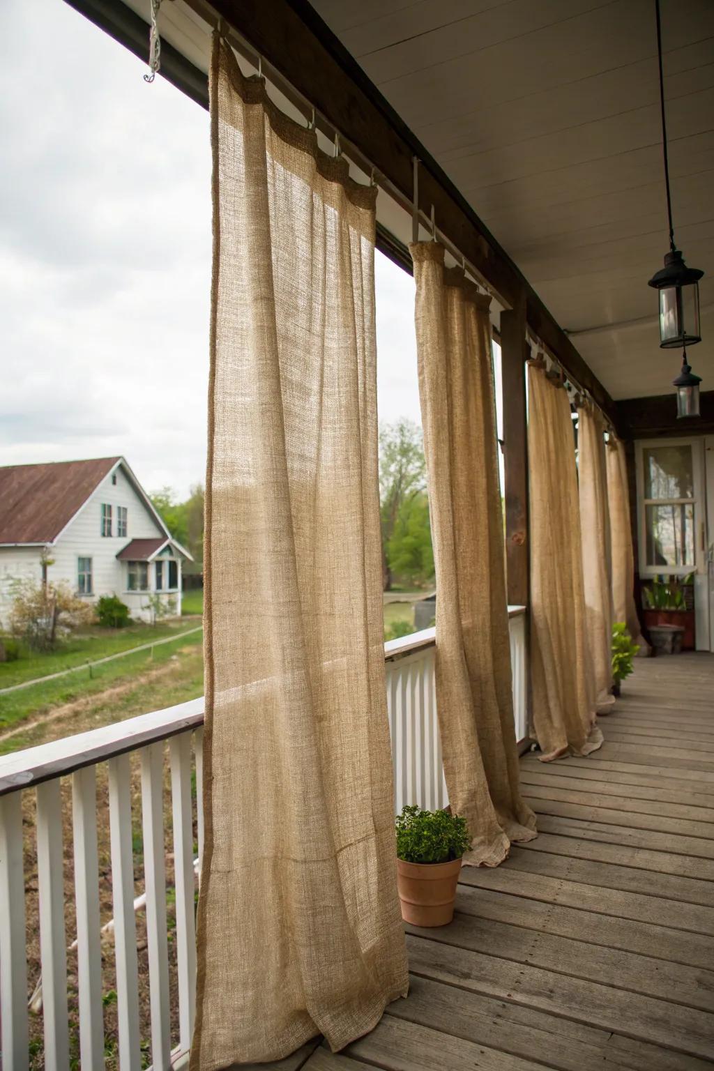 Coarse fiber drapes contribute rustic elegance and privacy.