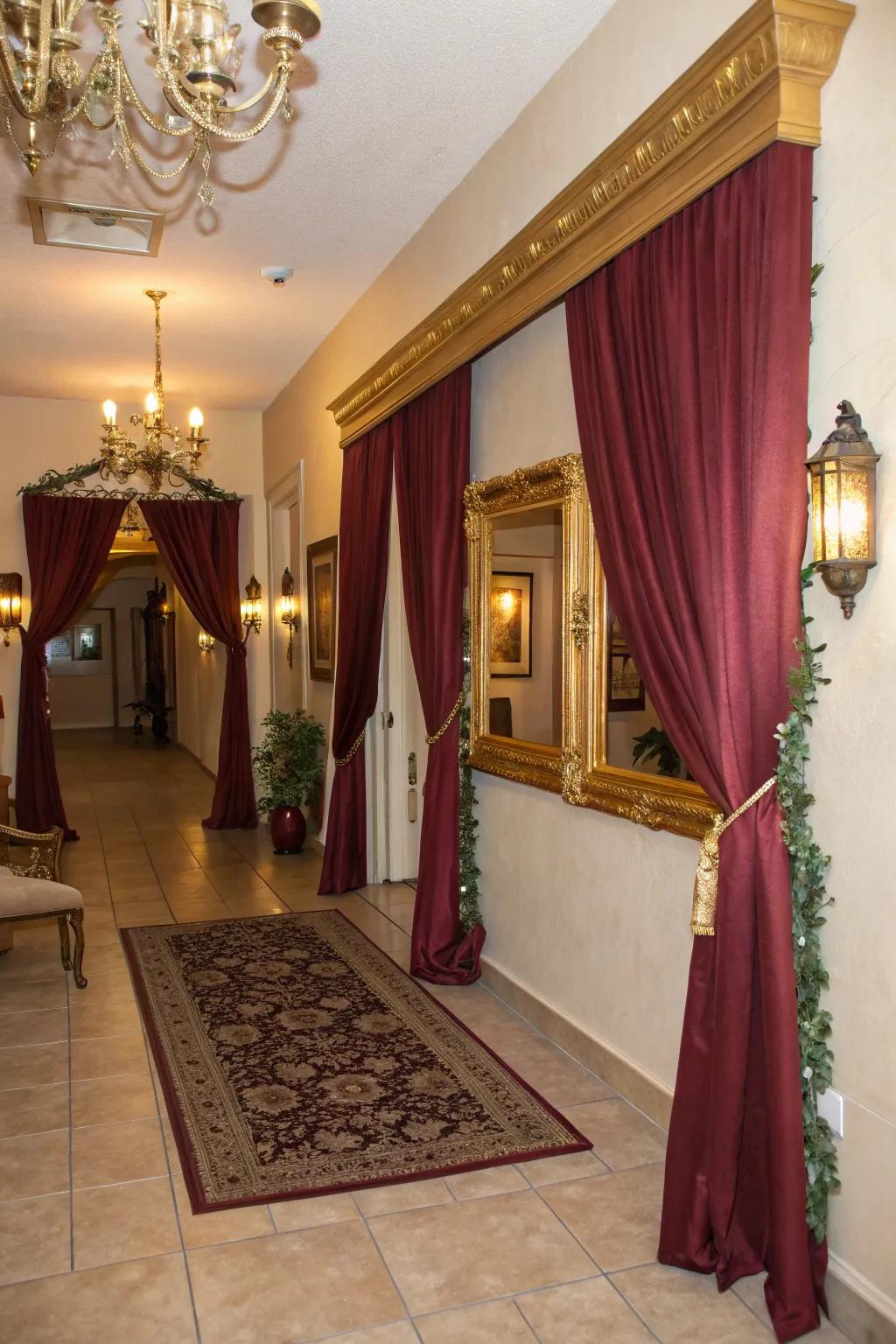 An inviting entryway with red and gold decor sets the mood for the event.