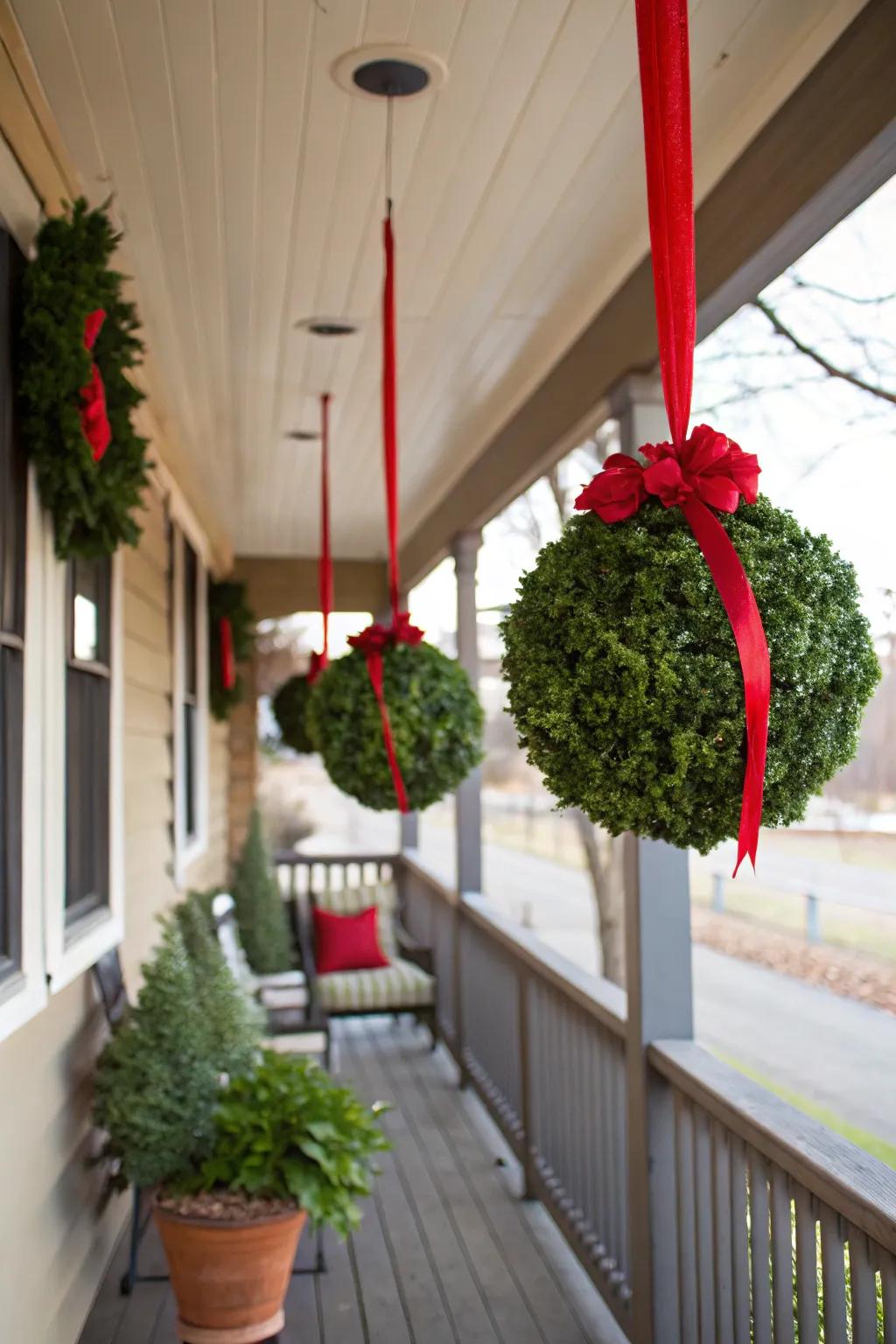 Elegant mistletoe spheres add romance to the porch.