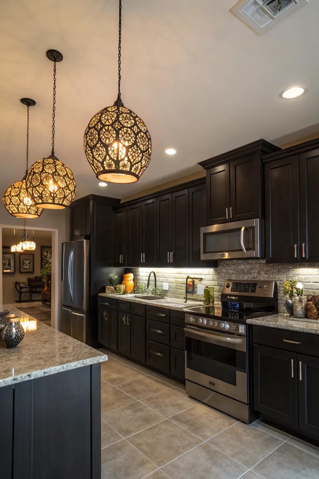 Dark cabinets illuminated by artistic pendant lighting for a creative kitchen area.