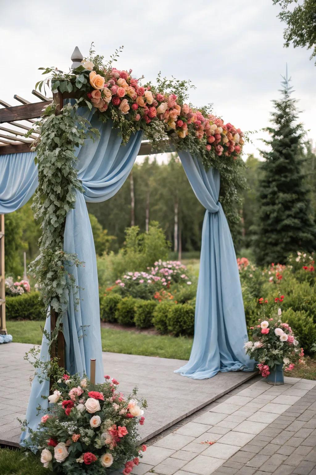 A stunning wedding arch with dusty blue details, creating a memorable ceremony backdrop.