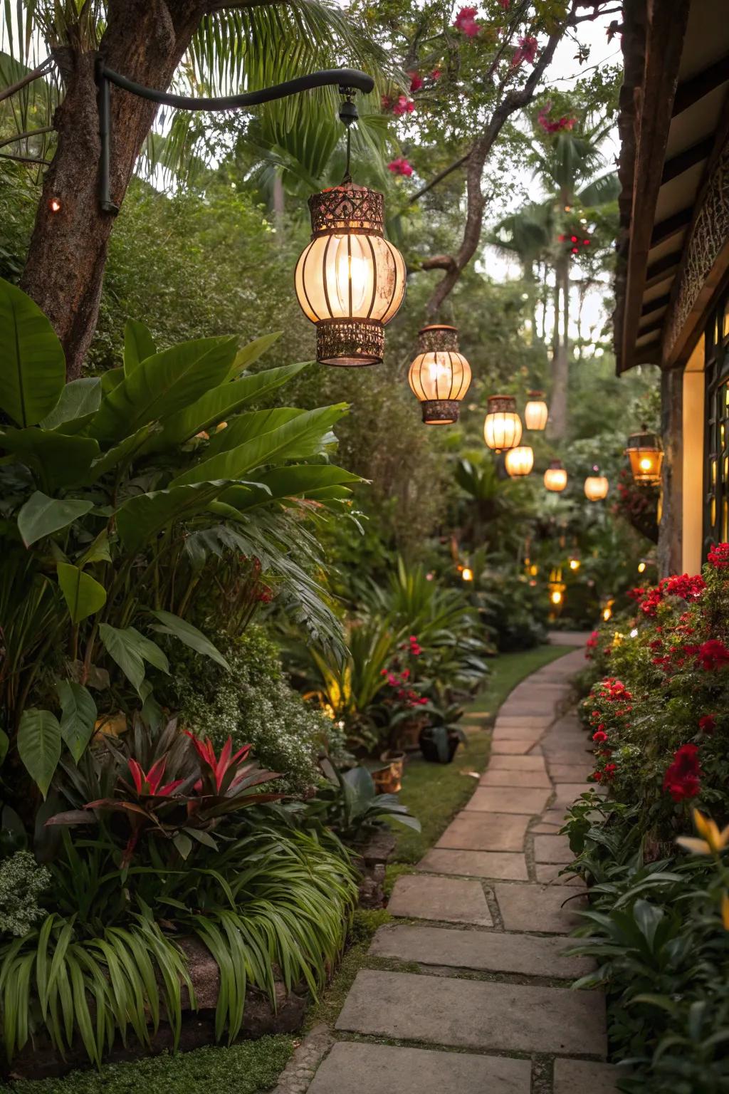 Lamps add a magical glow to the tropical garden at dusk.