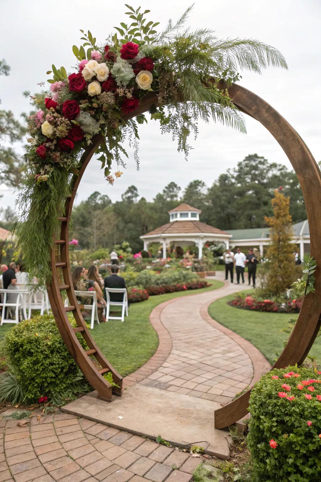 A rounded timber bower provides a modern modification to traditional wedding arches.