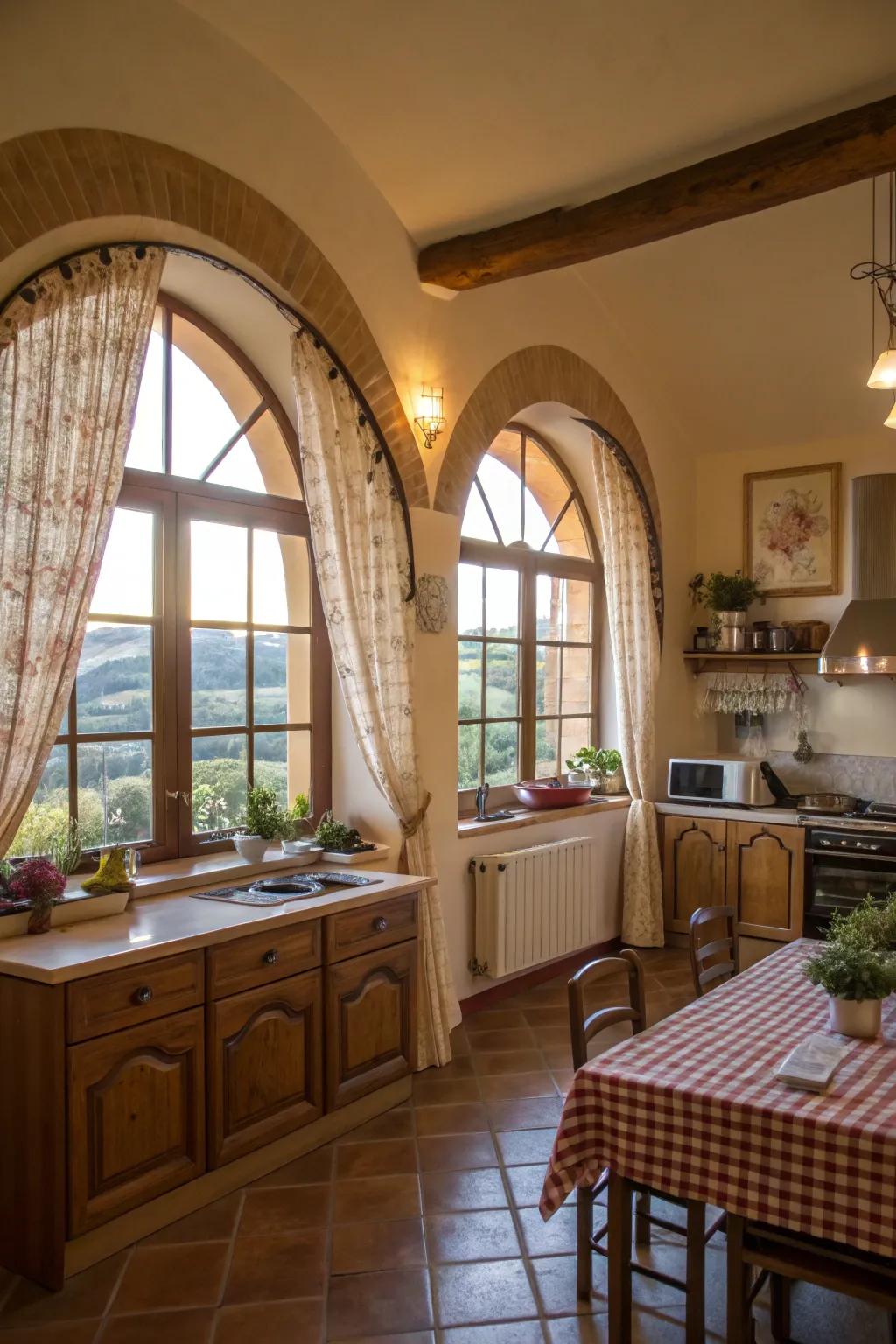 Cozy kitchen with cafe-style curtains on arched windows.