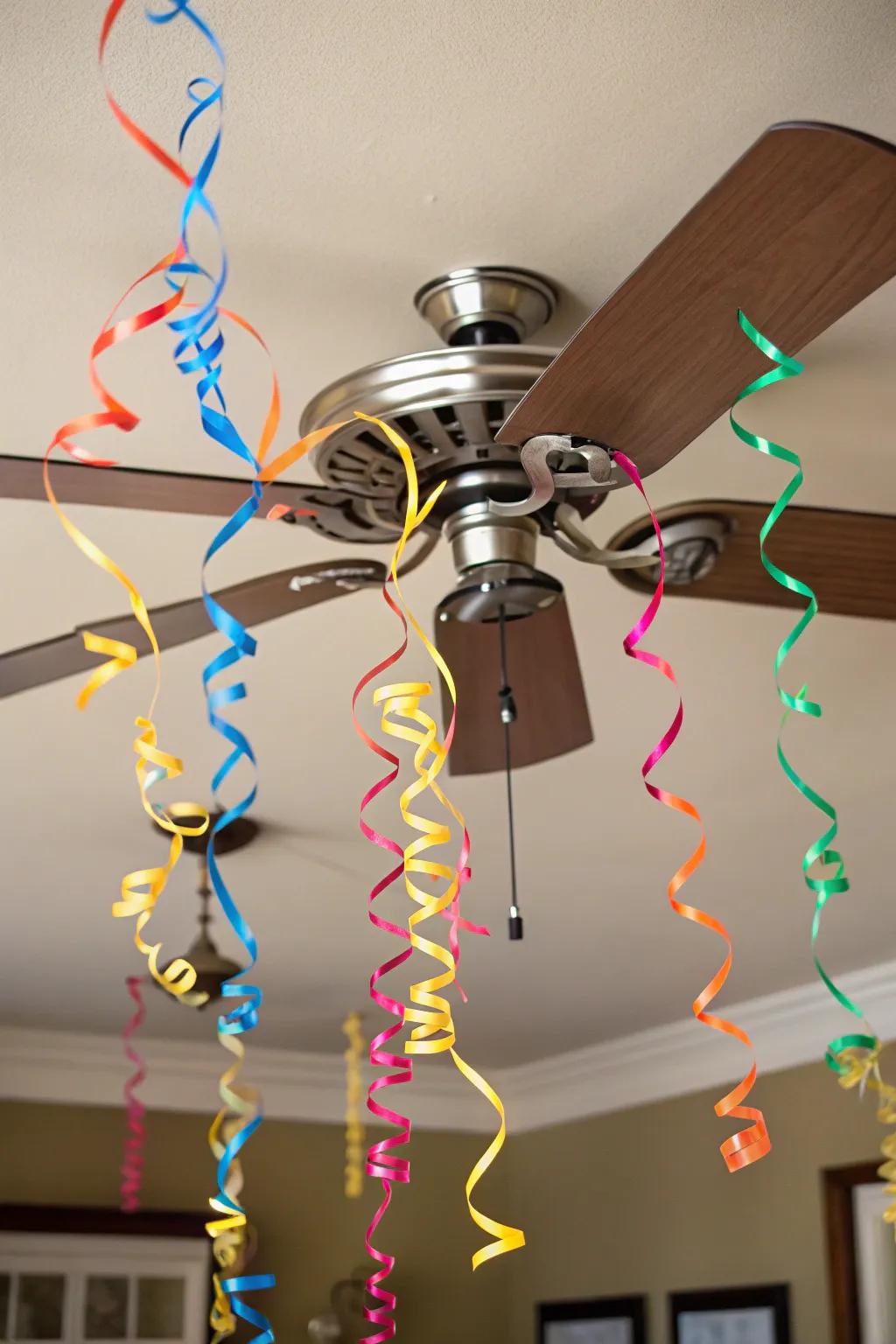 Include dynamic appeal using paper strips on a ceiling fan.